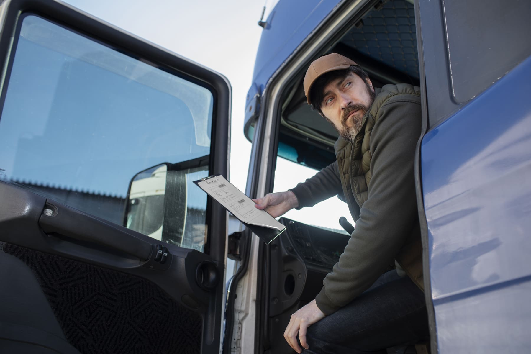low-angle-man-sitting-truck (1) (1)
